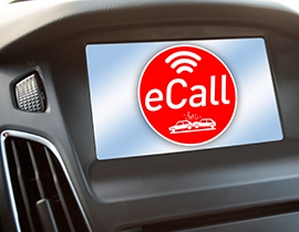 Salpicadero de un coche con una pegatina roja con la palabra eCall